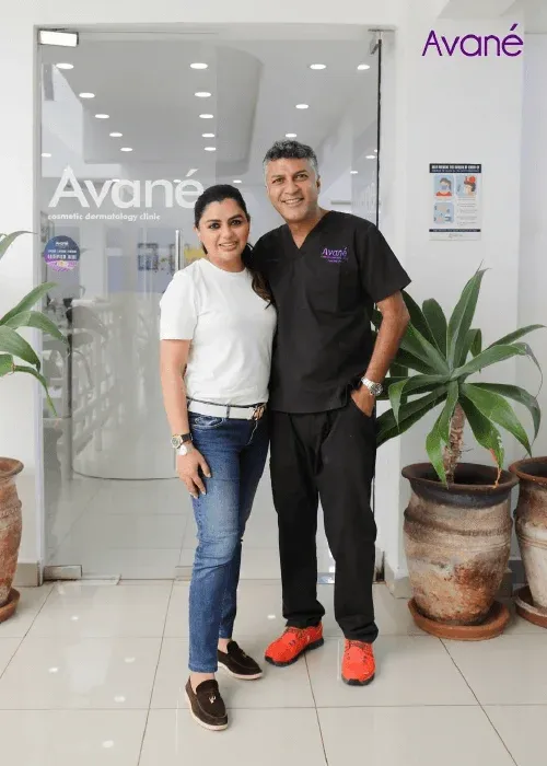 Cosmetic dermatology clinic staff and client.